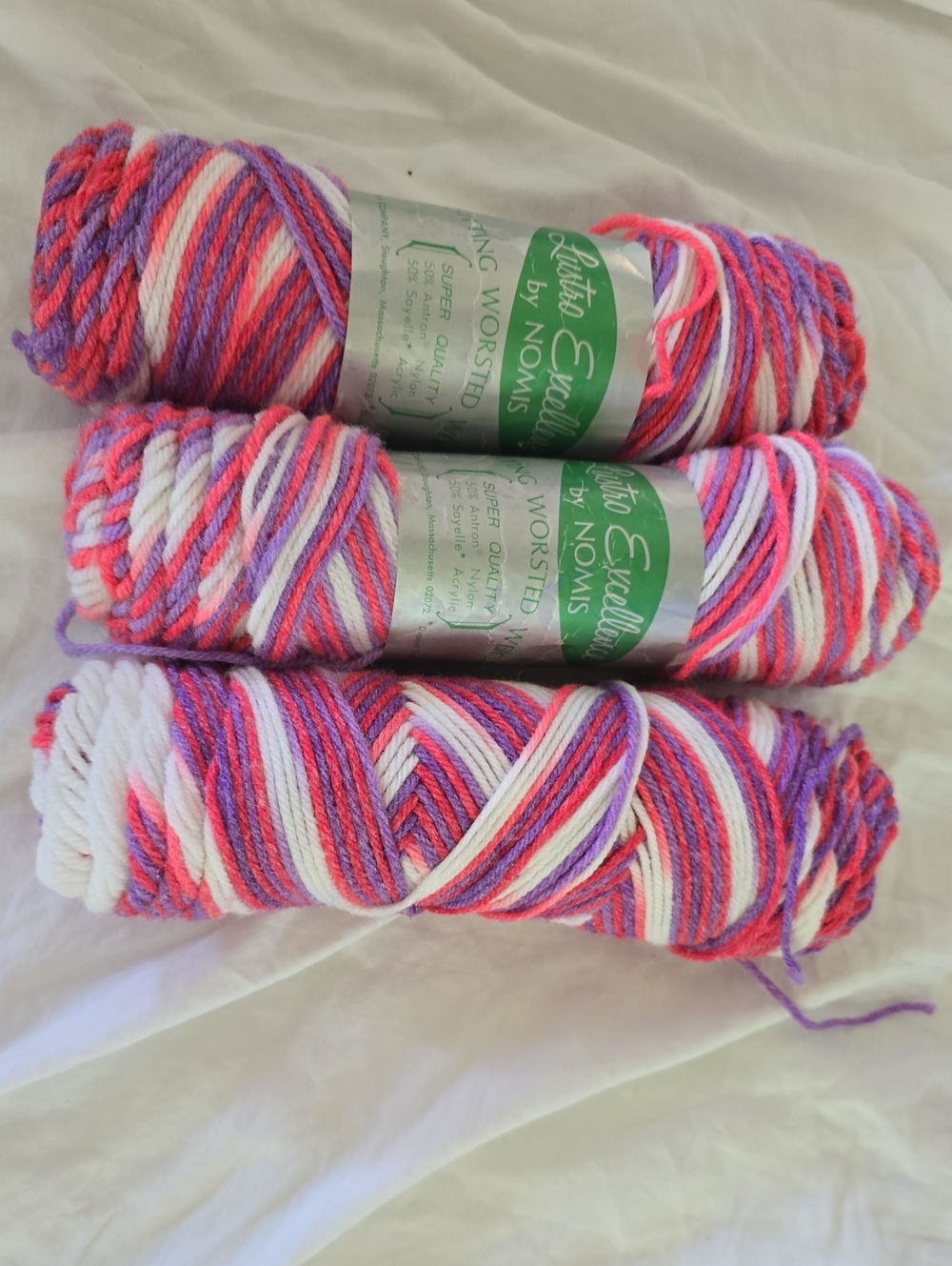 adidas variegated yarn skeins in pink, purple, white